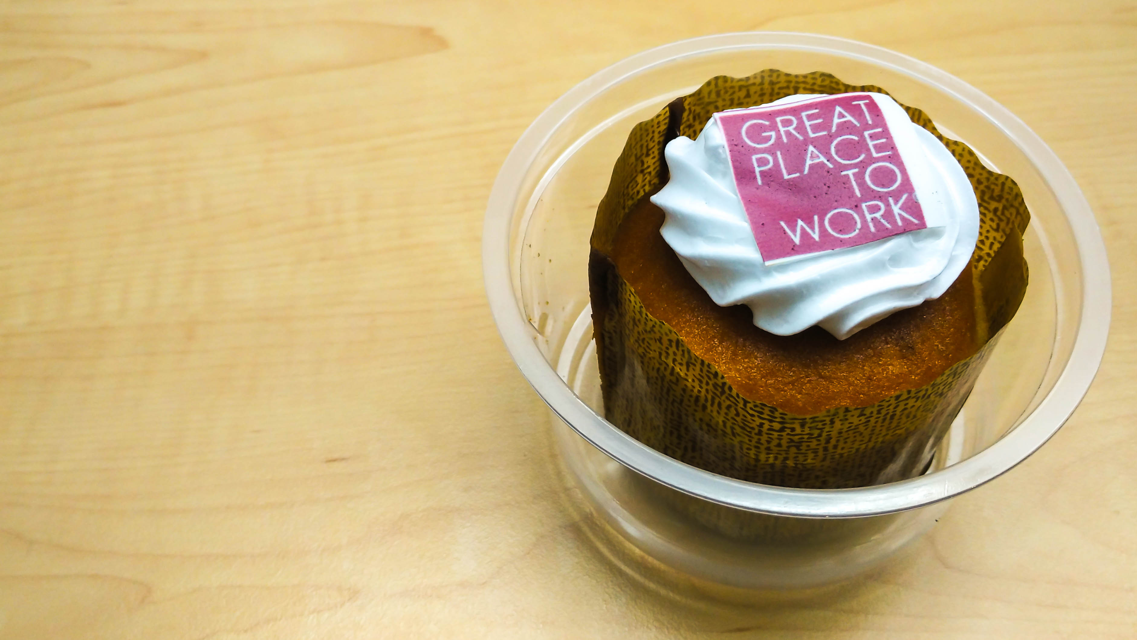 image of a cupcake with a great place to work message on it