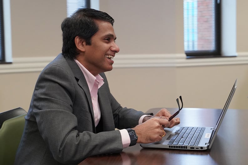 Illinois Mutual employee smiling during a meeting