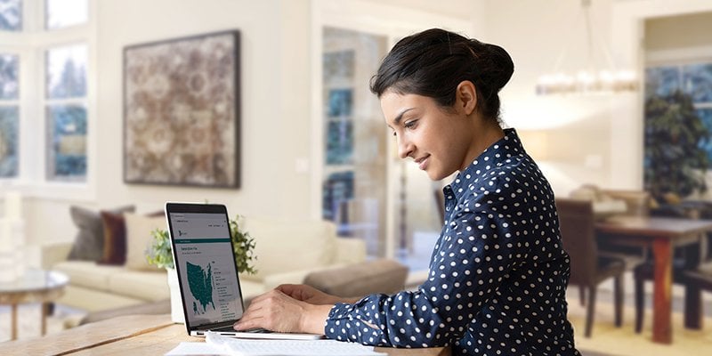 woman typing on the computer