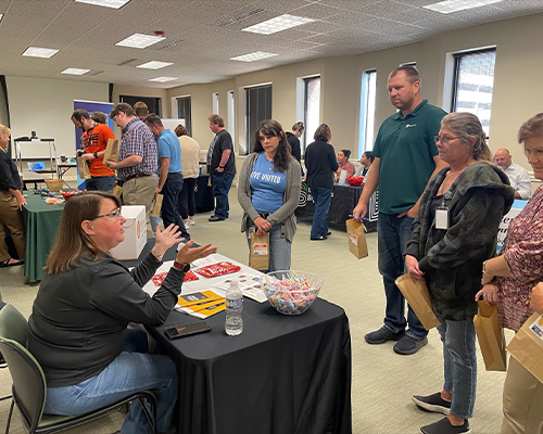 Illinois Mutual employees attending a fair to learn more about United Way volunteer opportunities