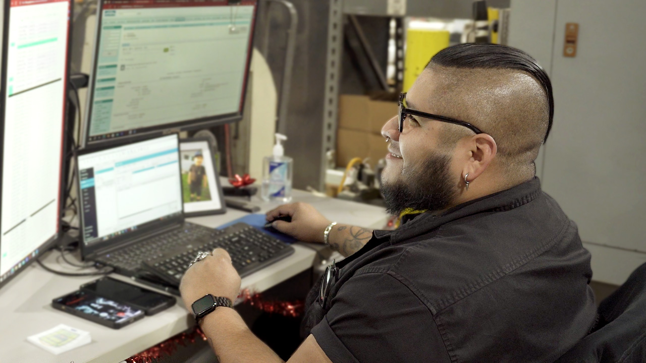 Perma-seal employee at their desk