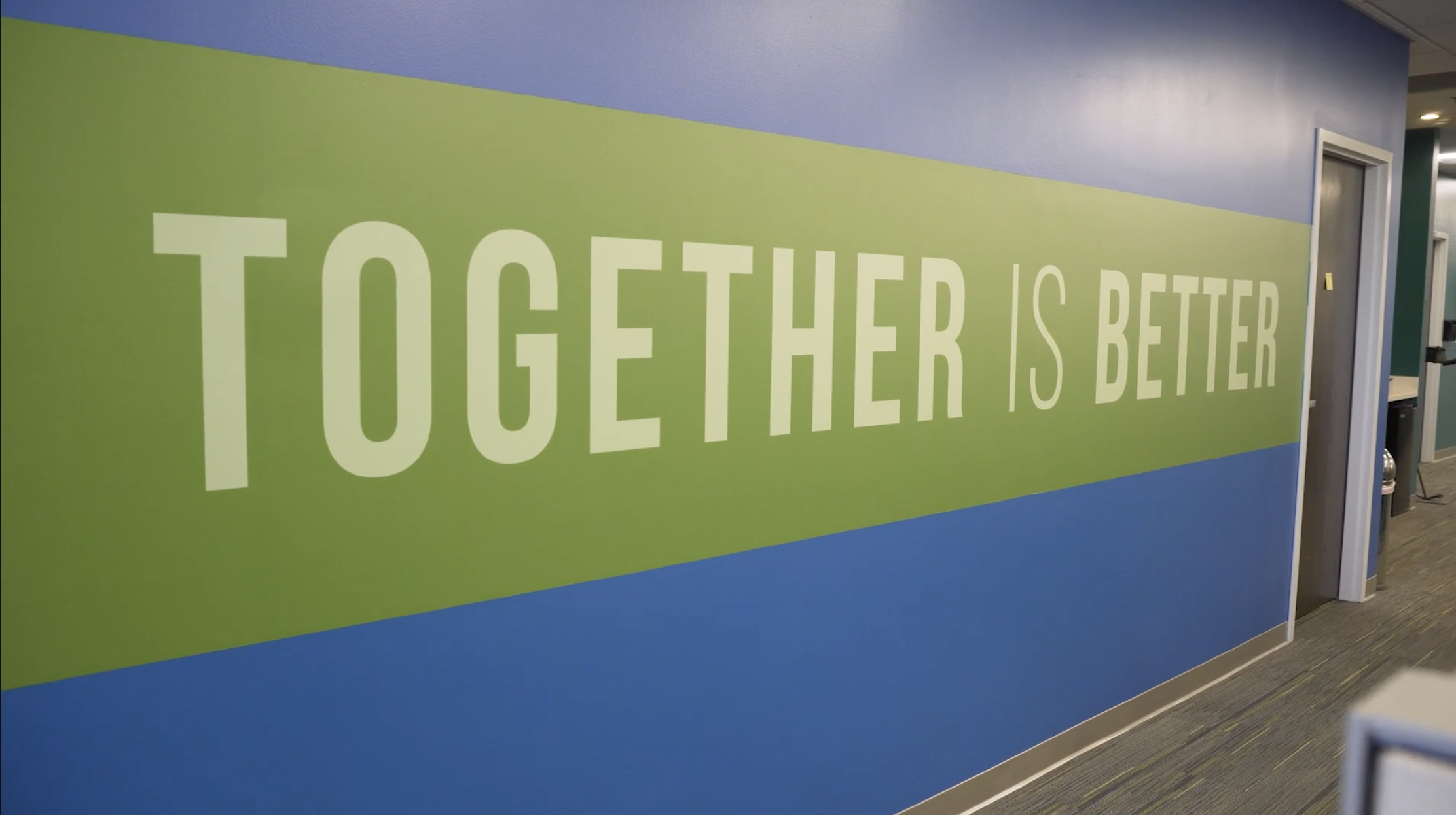 ws-2 Picture of a wall the says "Together is Better"