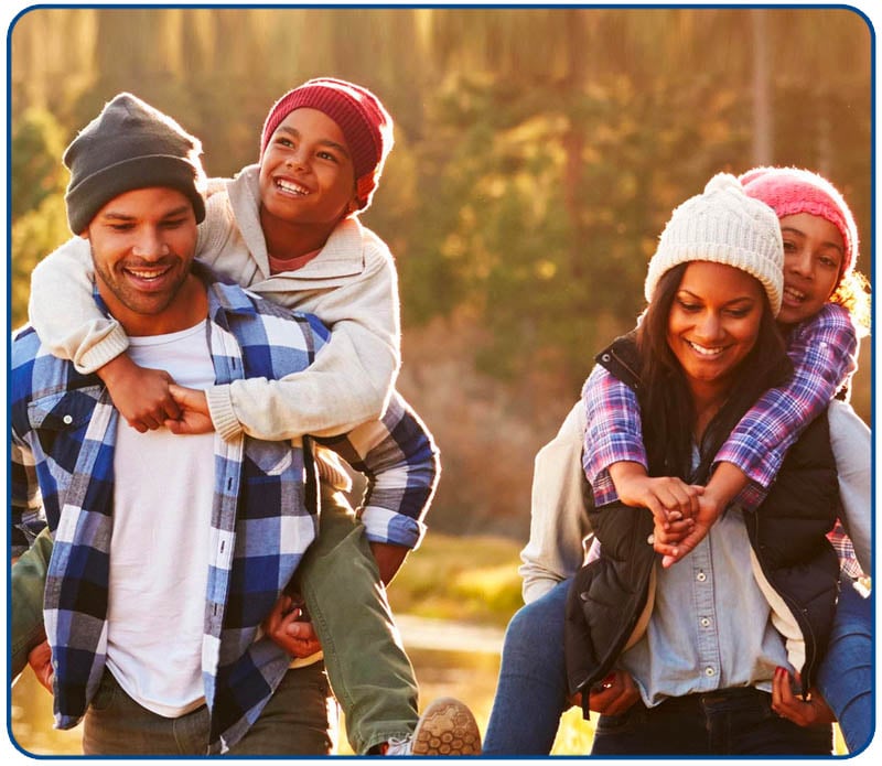 young family hiking in the Fall