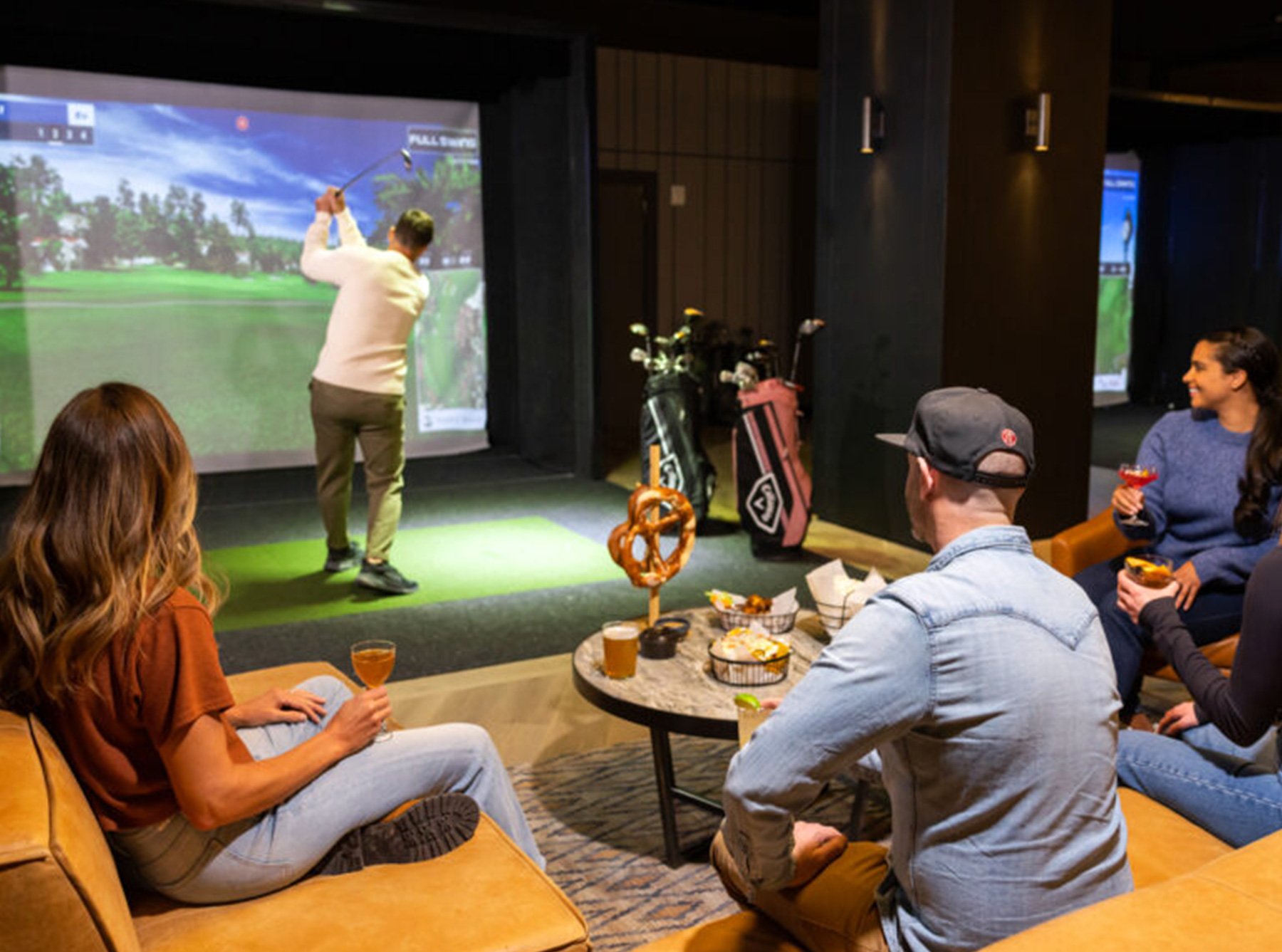 image of people enjoying a golf pro game