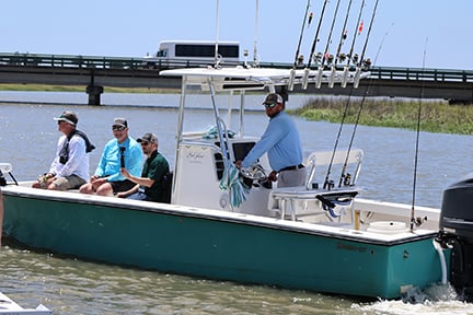 fishing boat coming in to the docks