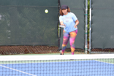 pickleball player in the middle of a match
