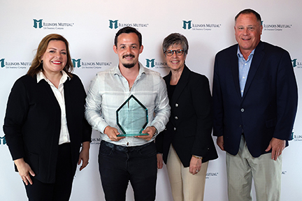 group photo with award winner, Cory