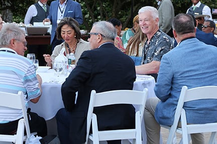 agents sitting down and talking at the welcome reception