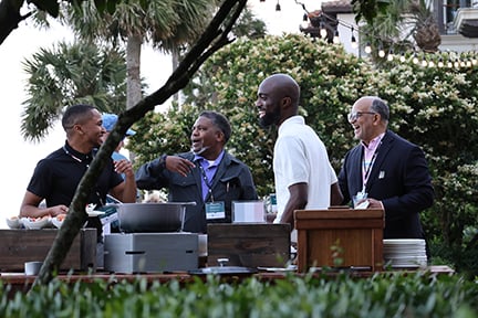 agents laughing at the welcome reception