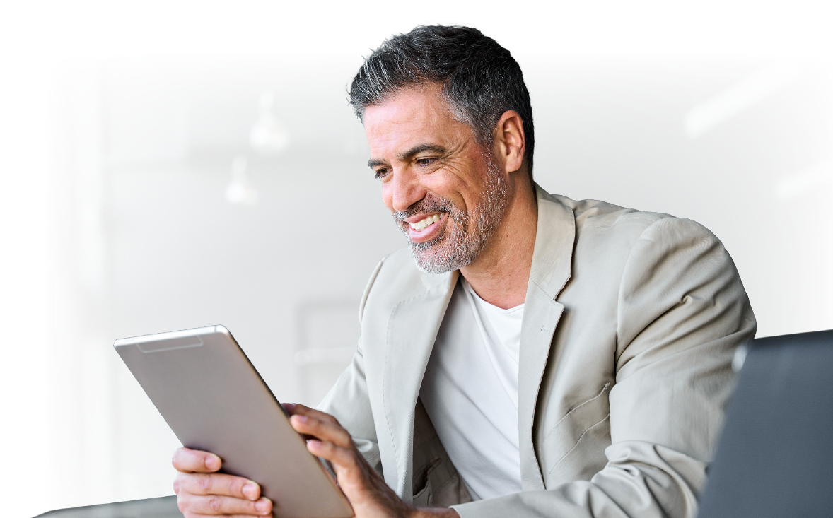 eapp-image business professional smiling while working on tablet