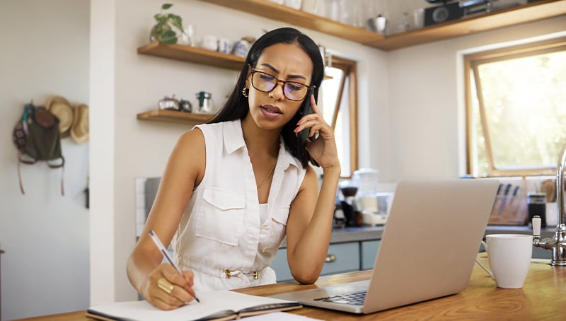 small business owner on the phone and tablet
