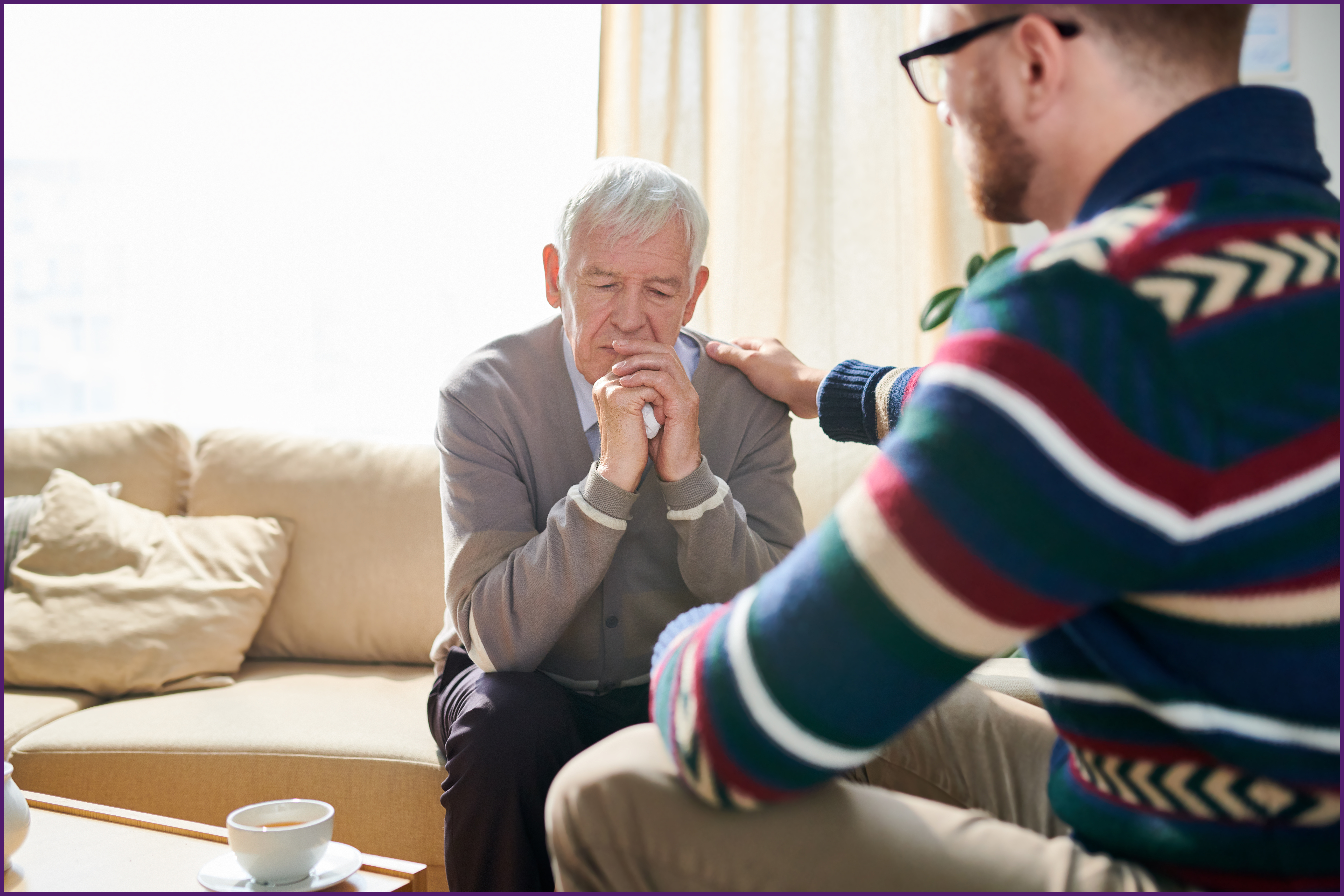 grieving-a-loved-one-264a4c975-50a1-48e0-8b9d-26c37a36feb7 image of a son comforting his father