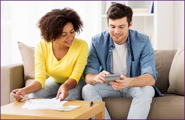 thumbnail image of a young couple looking at a calculator
