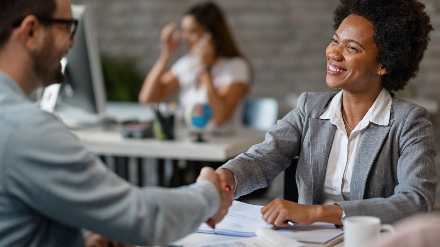 business professionals shaking hands