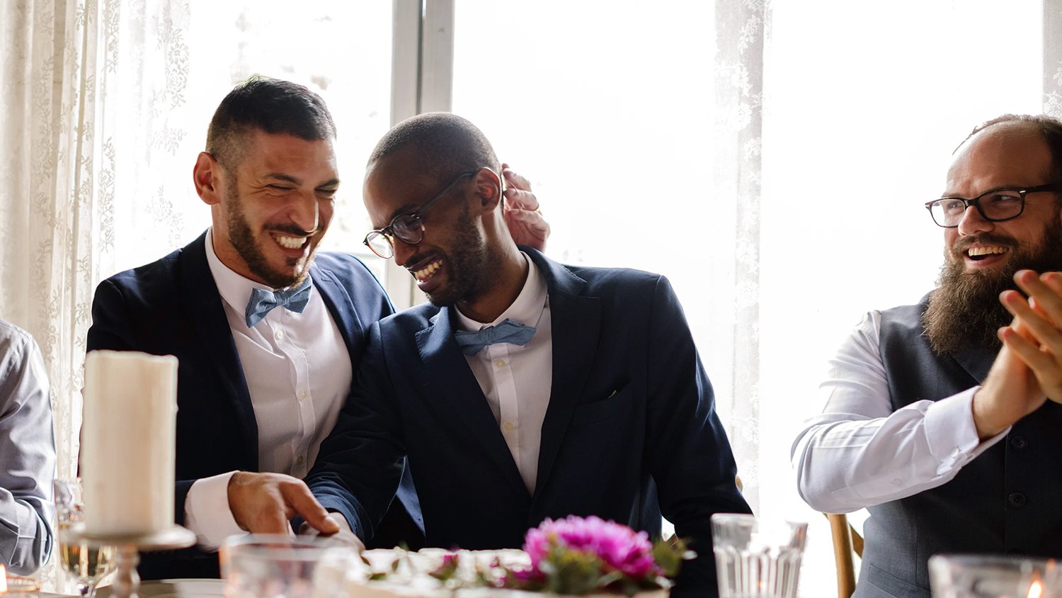 married couple kissing at wedding