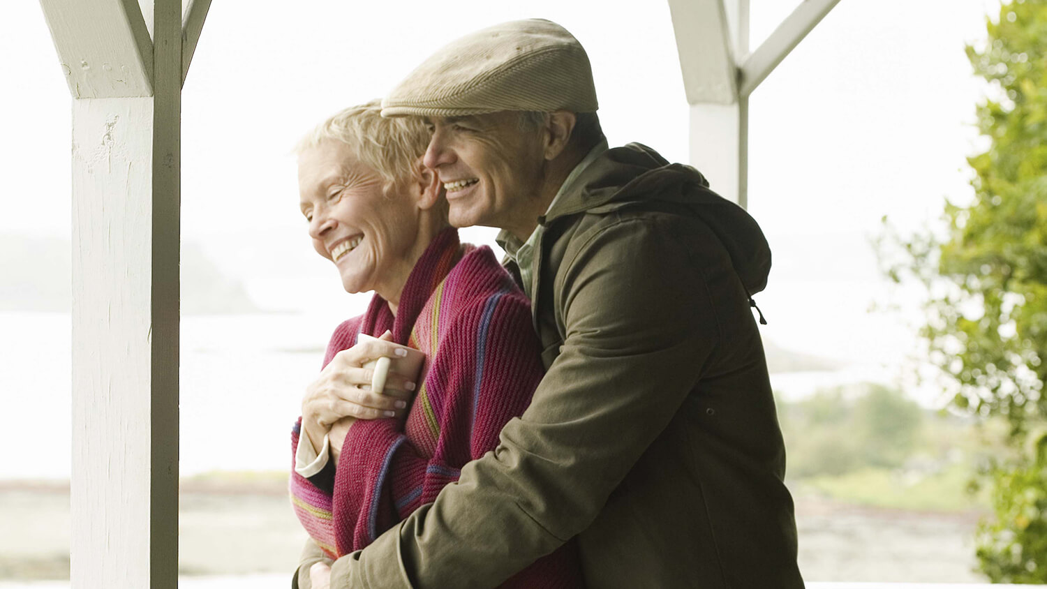 elderly couple embracing