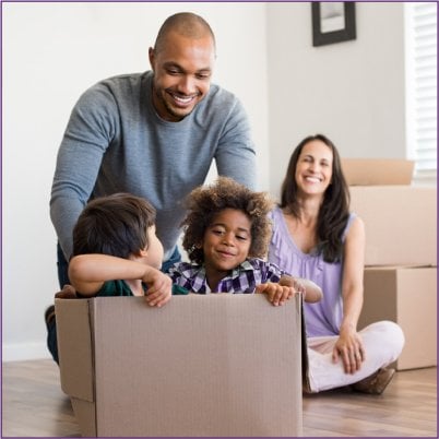 small family packing up to move