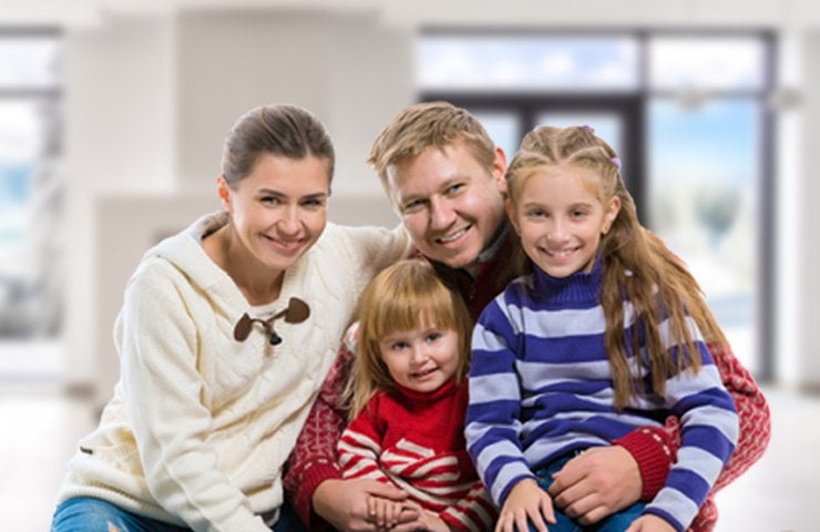 image of a young family in there home