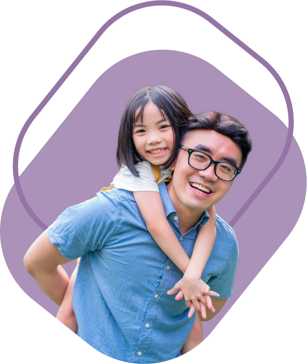 A father giving his daughter a piggy back ride