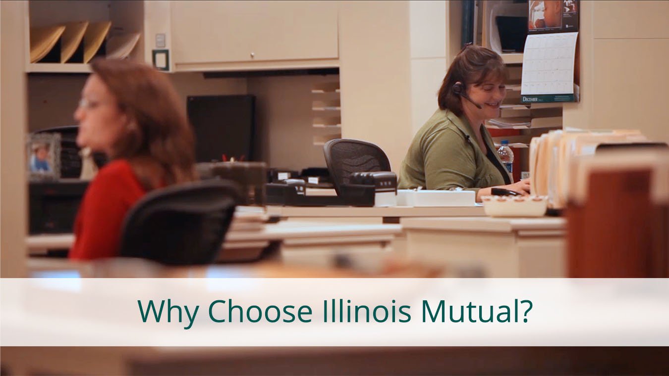 Illinois Mutual employees working at the desks