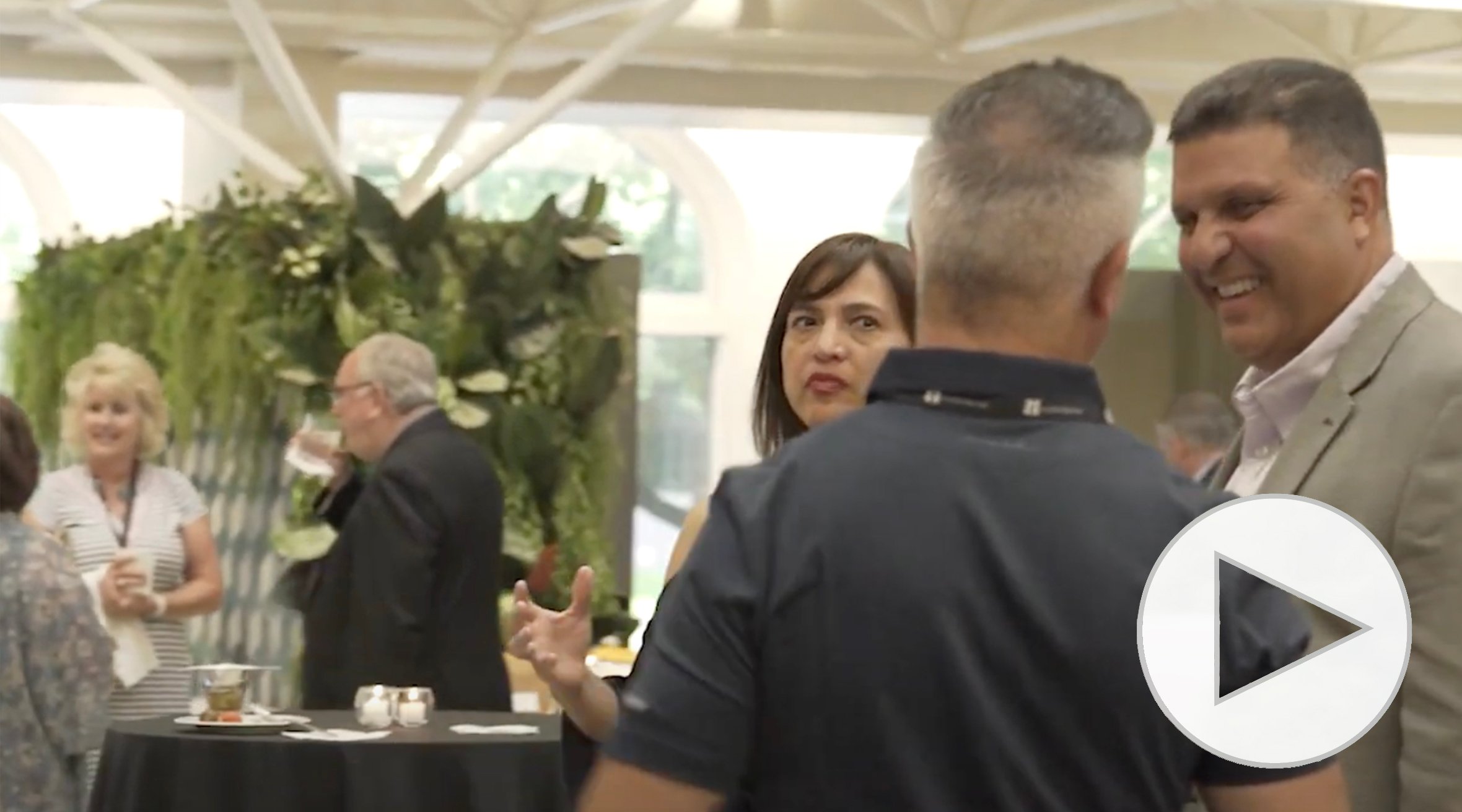 video thumbnail image of Illinois Mutual agents and guests talking